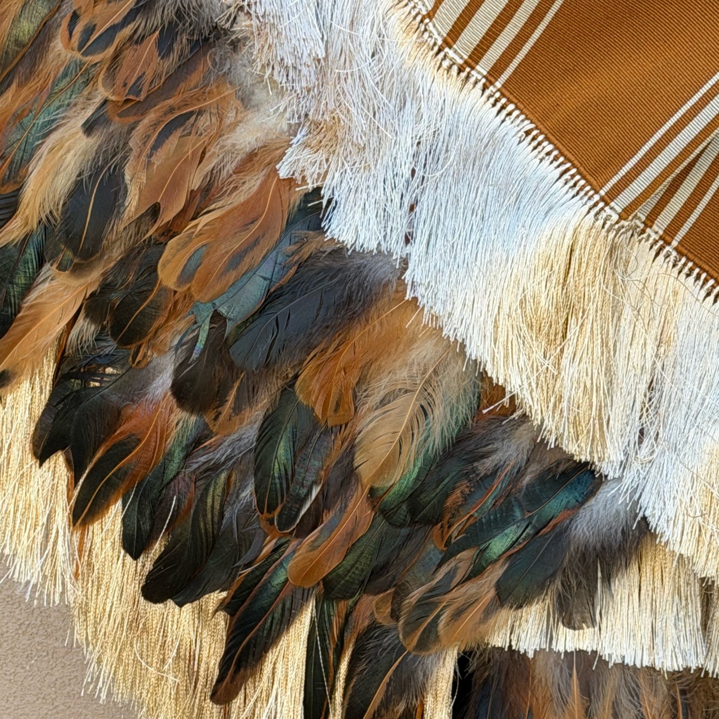Brown stripe purepecha rebozo with fringe and feathers