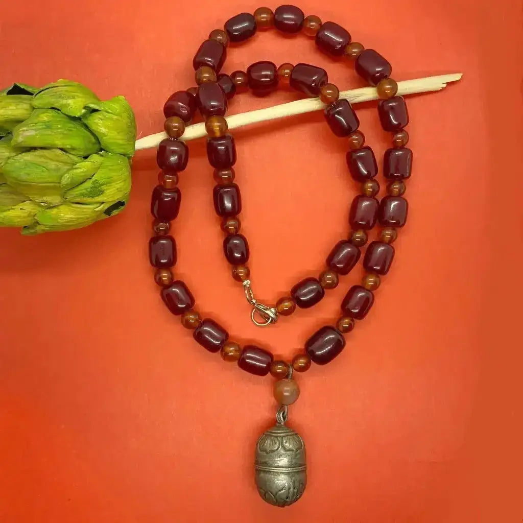 Chinese silver export pendant with jade and amber