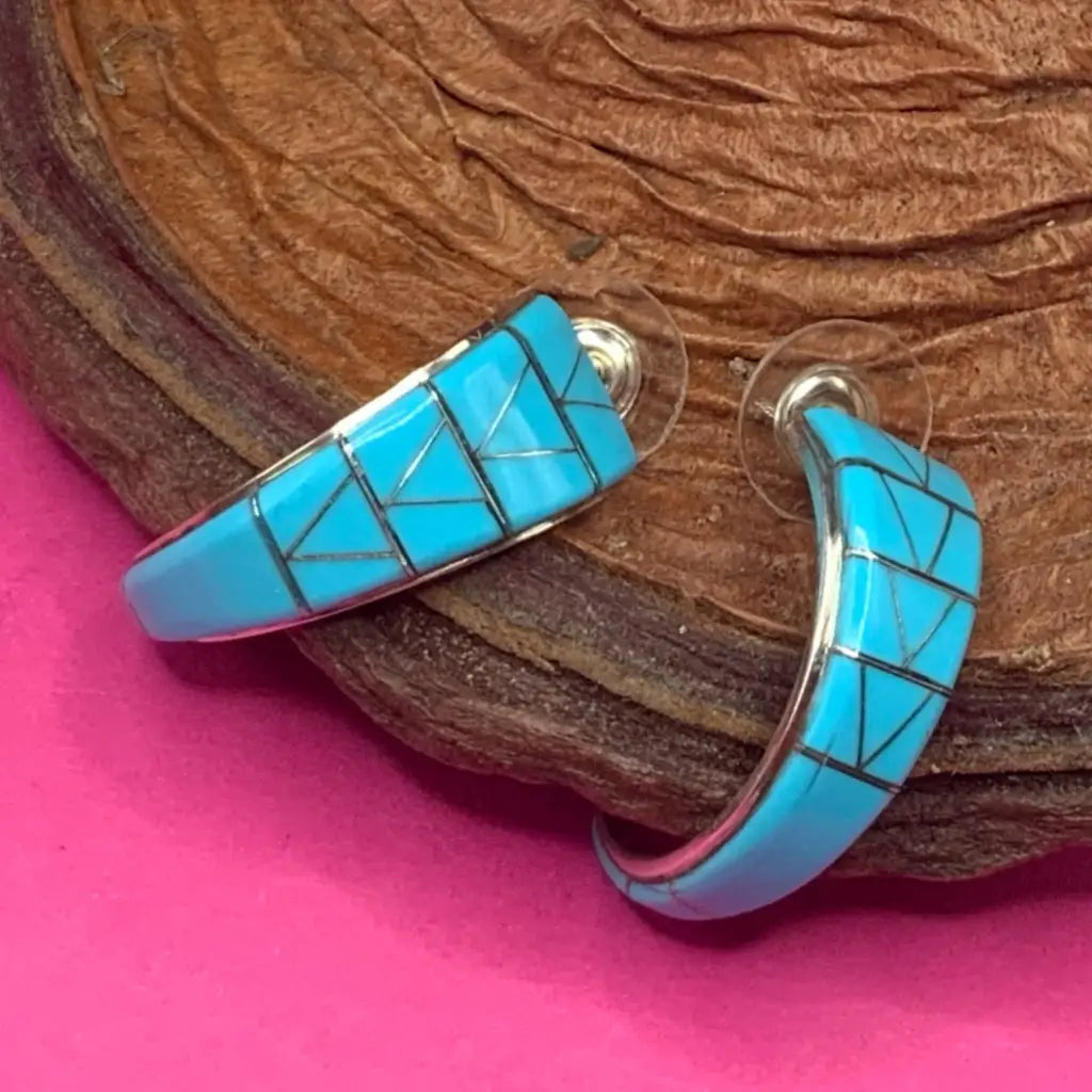 Silver inlaid turquoise earrings from Crownpoint Navajo made