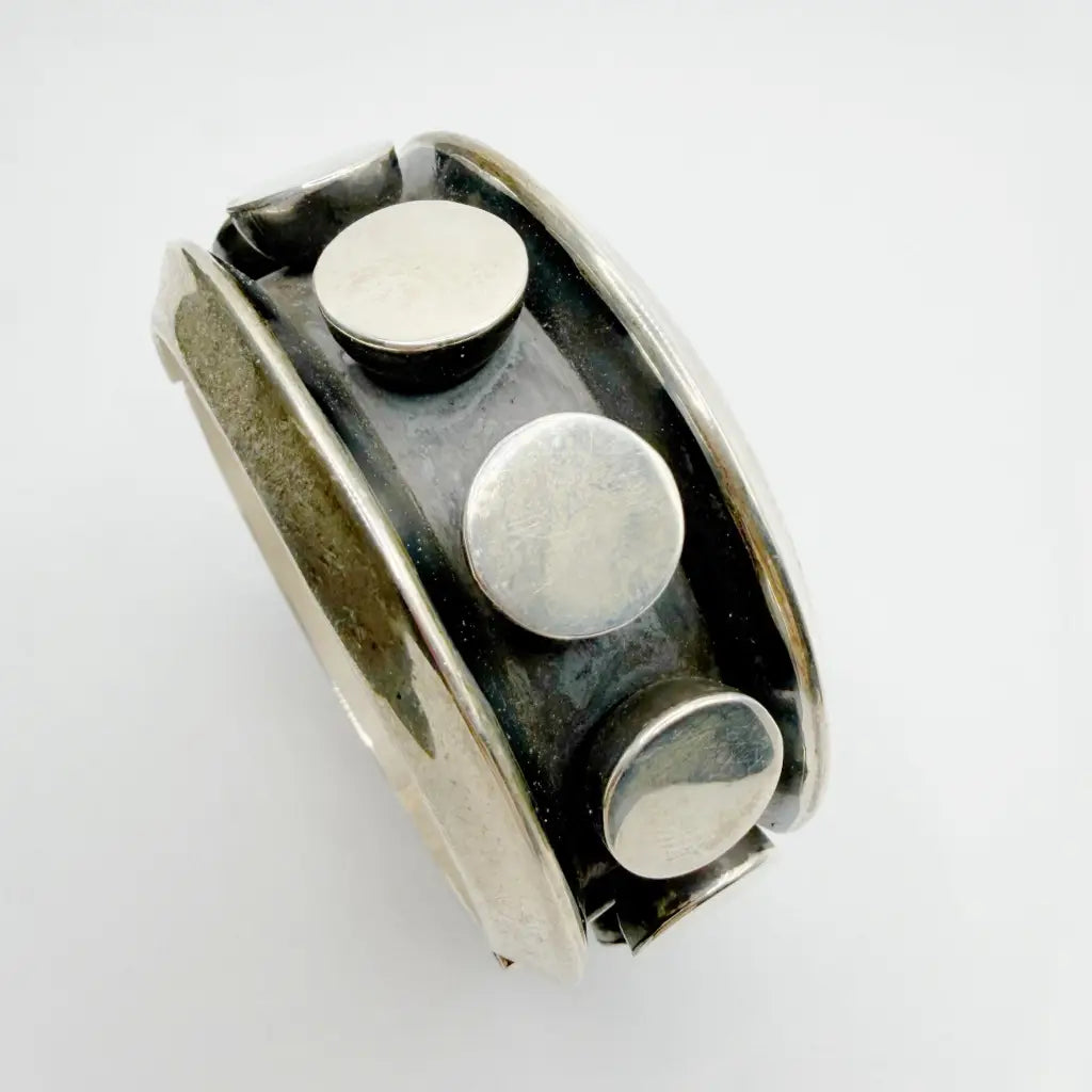 Vintage silver Taxco bracelet with circles-clamper